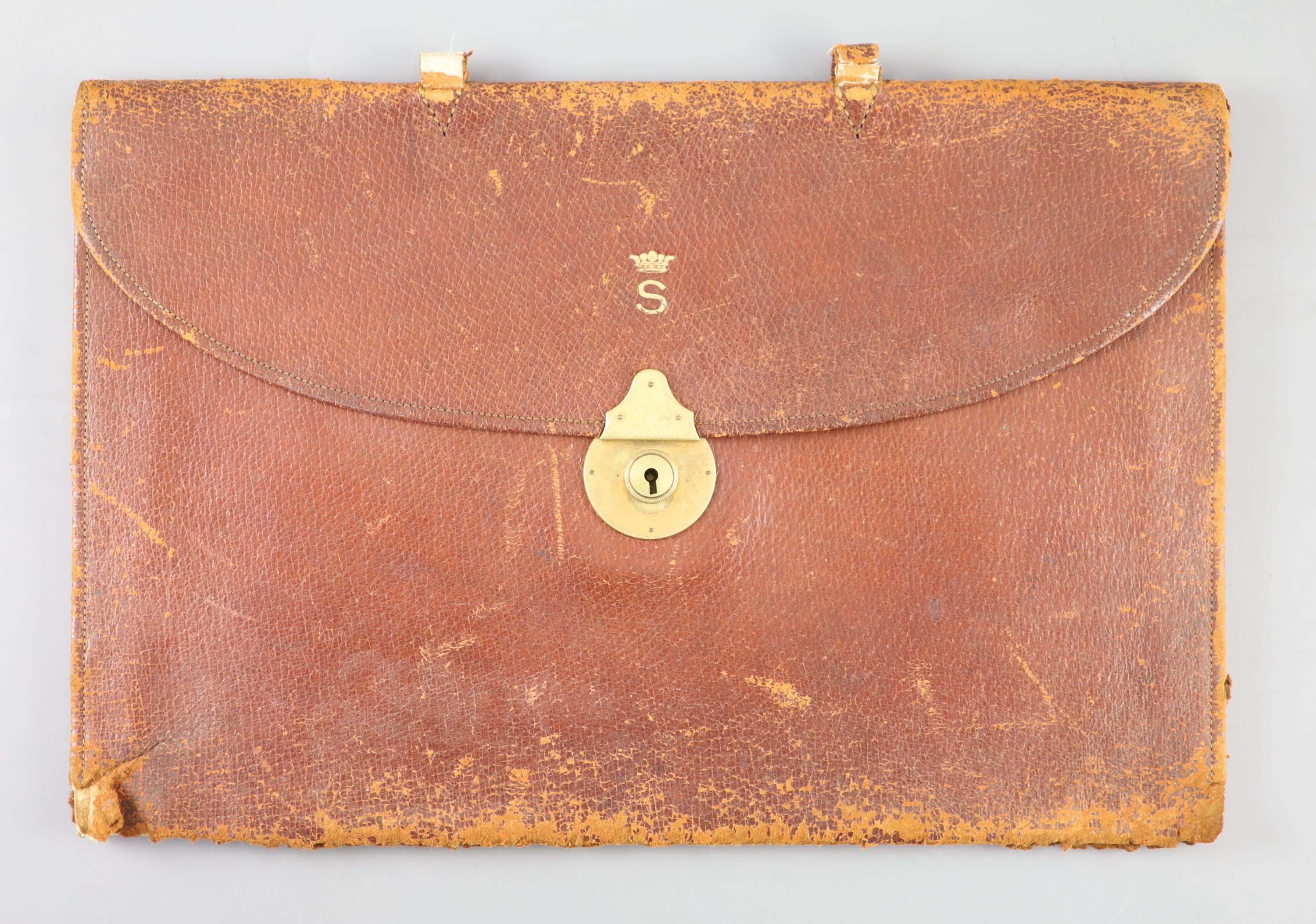 A leather attache case, the property of Lady Doreens father the sixth Marquess of Sligo, 24 x 36cm.